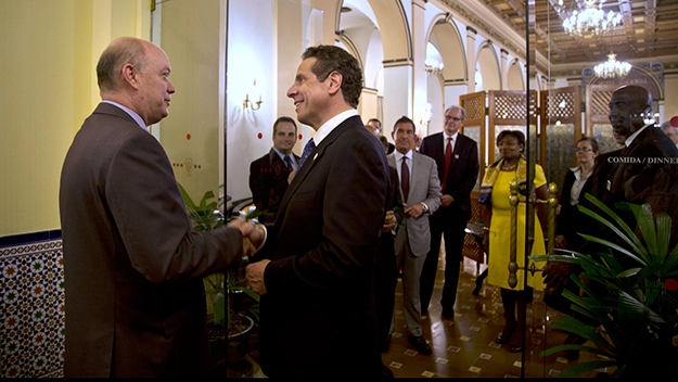Gov. Andrew Cuomo visits with Cuban government officials.